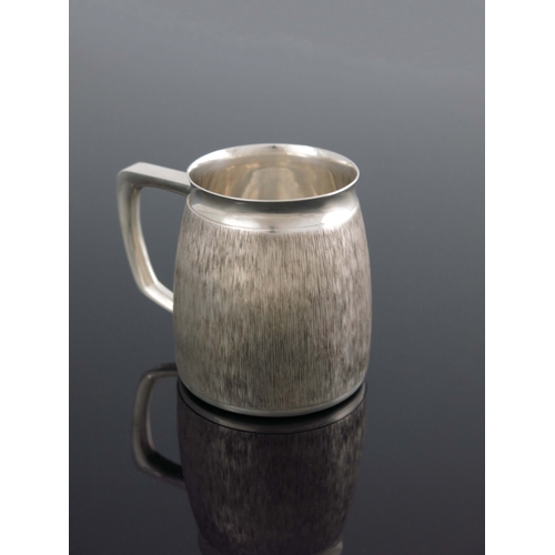 171 - Christopher Lawrence for Boodle and Dunthorne, a Modernist silver mug, London 1970, rounded barrel f... 