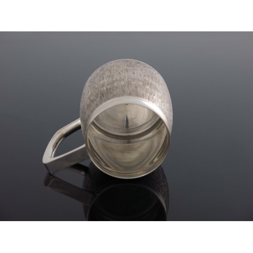 171 - Christopher Lawrence for Boodle and Dunthorne, a Modernist silver mug, London 1970, rounded barrel f... 