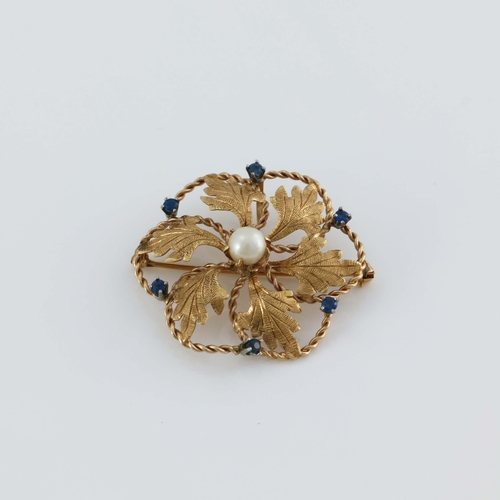 176 - A 14 carat gold, pearl and sapphire brooch, the central stone within radiating leaves and open ropet... 