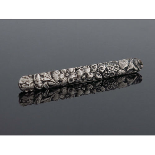 183 - Jenkins and Jenkins, an American Art Nouveau silver brooch, Baltimore circa 1910, bar form, cast and... 