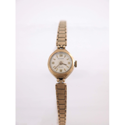 197 - Rotary, a 9 carat gold ladies bracelet wristwatch, 15mm diameter, on link bracelet with safety chain... 