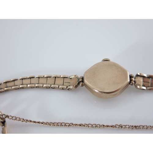 197 - Rotary, a 9 carat gold ladies bracelet wristwatch, 15mm diameter, on link bracelet with safety chain... 