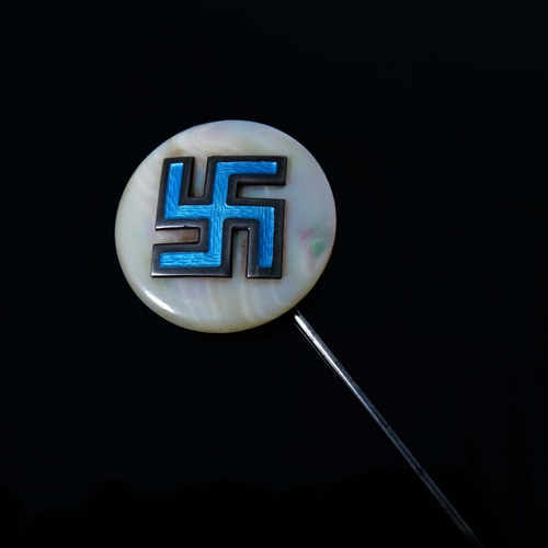 208 - A Swastika pin badge, enamel swastika mounted on mother of pearl and silver pin, Arthur Johnson Smit... 