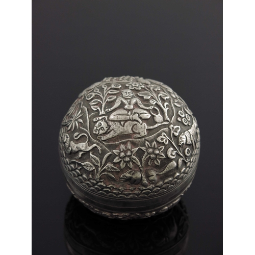 15 - An Indian white metal repousse box, probably Kutch, spherical form, chased and engraved with figures... 