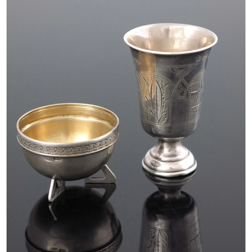 28 - An Imperial Russian silver salt cellar, 23rd Artel, St Petersburg circa 1908, and a drinking cup 189... 