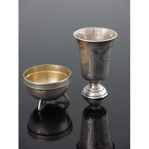 28 - An Imperial Russian silver salt cellar, 23rd Artel, St Petersburg circa 1908, and a drinking cup 189... 