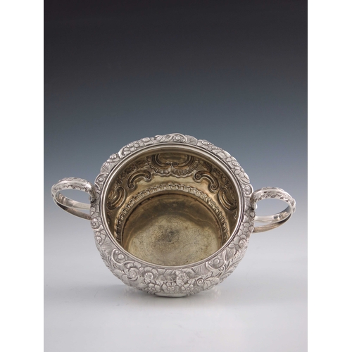 38 - A George IV Irish silver twin handled bowl, James Le Bas, Dublin 1824, squat shouldered form with do... 