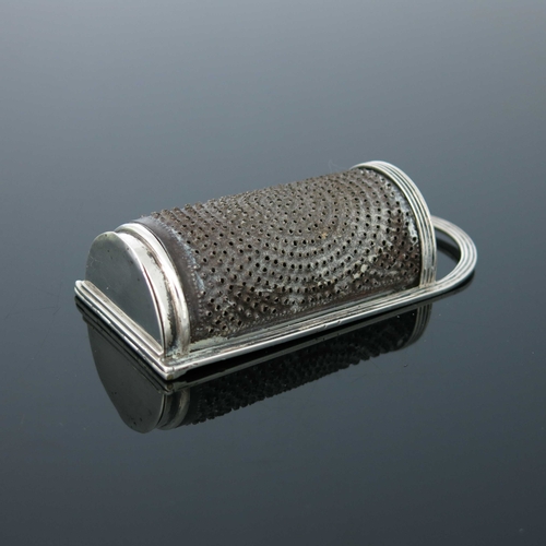 40 - A George III silver nutmeg grater, William Ellerby, London 1812, of bowfront form with reeded loop h... 