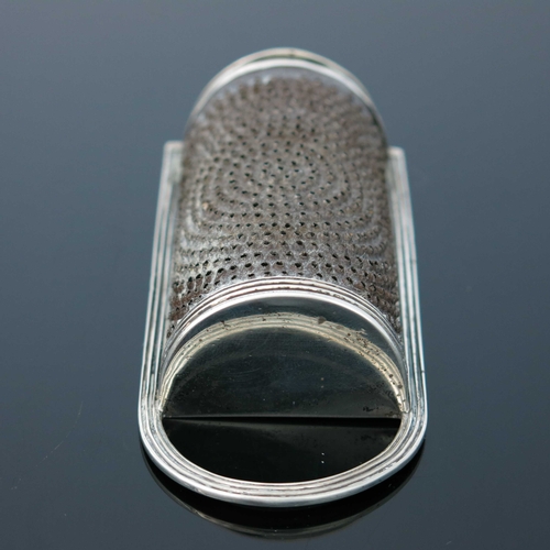 40 - A George III silver nutmeg grater, William Ellerby, London 1812, of bowfront form with reeded loop h... 