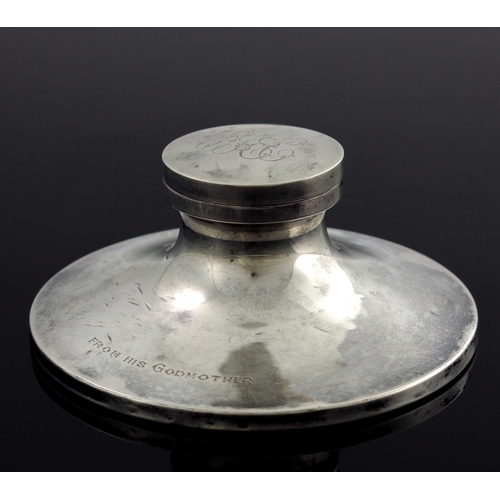 46 - A George V silver capstan inkwell, William Neale, Birmingham 1924, splayed form with hinged lid and ... 