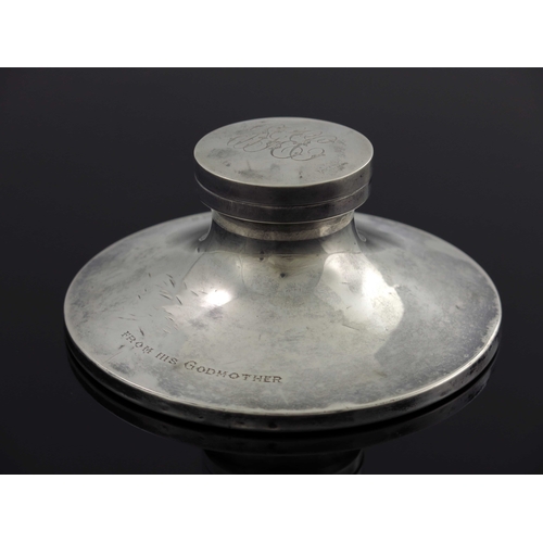 46 - A George V silver capstan inkwell, William Neale, Birmingham 1924, splayed form with hinged lid and ... 