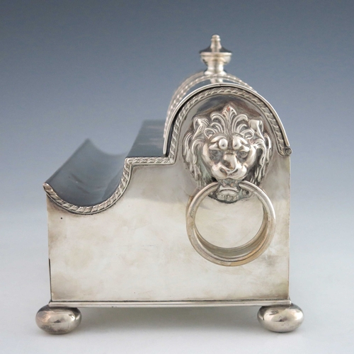 55 - An Edwardian Old Sheffield Plate ink stand, stepped casket form with lions mask and ring handles, ba... 