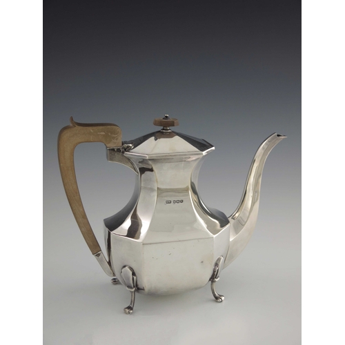 56 - A George VI silver coffee pot, Edward Viner, Sheffield 1939, canted baluster form with fruitwood han... 