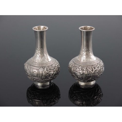 7 - A small pair of Chinese export silver vases, Wang Hing, Canton circa 1890, globe and shaft form, emb... 