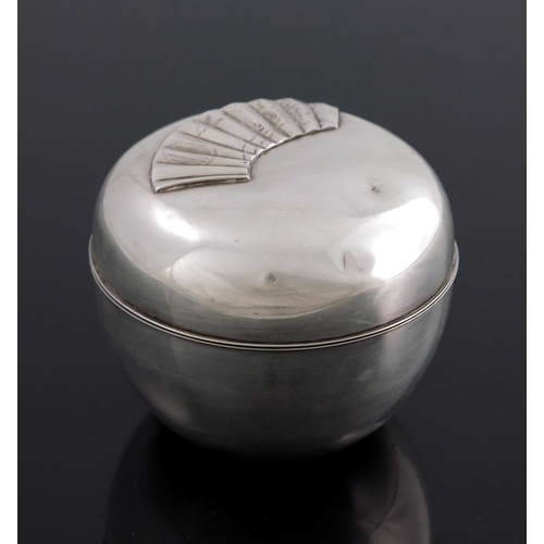 9 - A Japanese silver vanity box, ovoid form, double cased, the lid embossed to the outer shell with a f... 