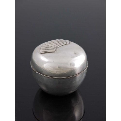 9 - A Japanese silver vanity box, ovoid form, double cased, the lid embossed to the outer shell with a f... 