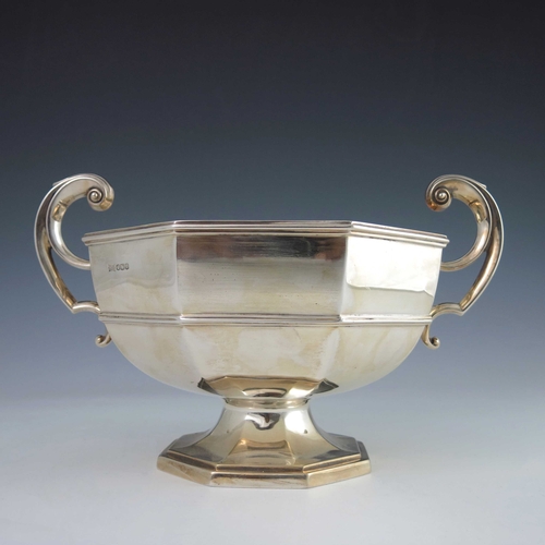 69 - A George V silver twin handled bowl, Walker and Hall, Sheffield 1927, banded octagonal section round... 