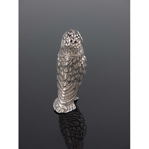 77 - A Victorian novelty silver pepper pot, Creswick and Co., Sheffield 1851, modelled as an owl, the rem... 