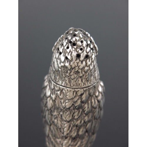 77 - A Victorian novelty silver pepper pot, Creswick and Co., Sheffield 1851, modelled as an owl, the rem... 