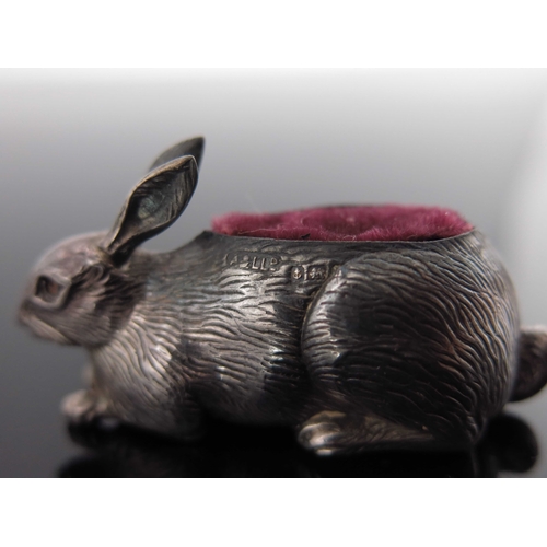 89 - An Edwardian novelty silver pin cushion, Adie and Lovekin, Birmingham 1907, modelled as a hare, lyin... 