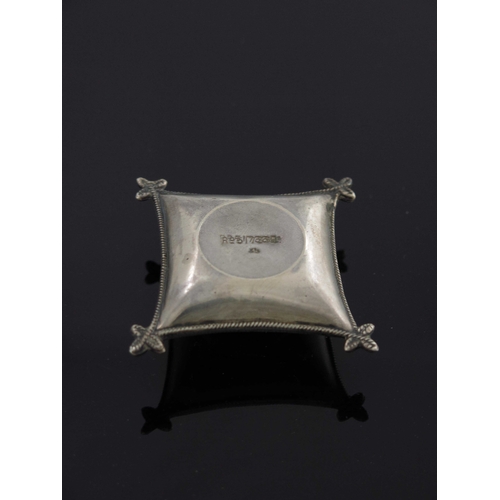 94 - A George V novelty silver pin cushion, A and J Zimmermann, Birmingham 1911, modelled as a cushion wi... 