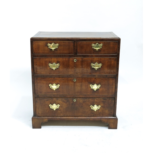 345 - A George III mahogany chest of drawers, circa 1770, crossbanded and strung throughout, moulded top, ... 