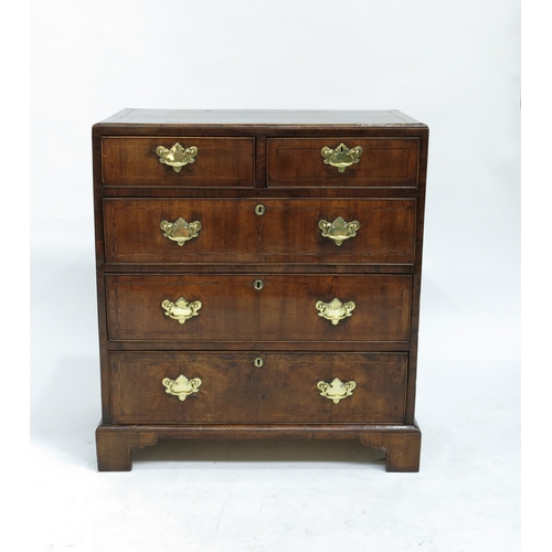 345 - A George III mahogany chest of drawers, circa 1770, crossbanded and strung throughout, moulded top, ... 