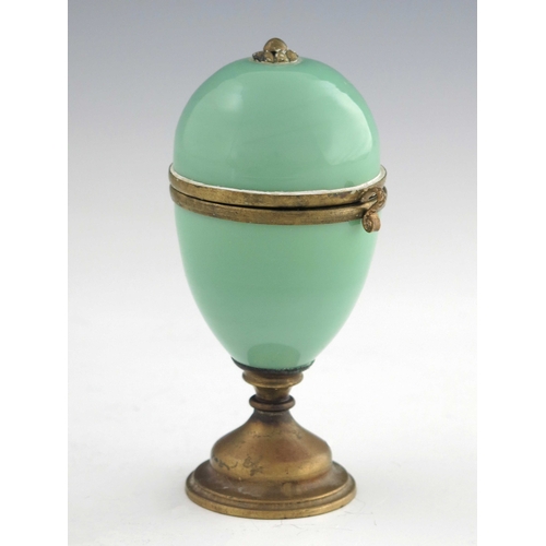 375 - A French Palais Royale glass and gilt mounted pedestal egg box and scent bottle, the jade green box ... 