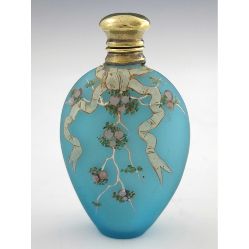 379 - An enamelled satin glass scent bottle, probably Continental, circa 1890, painted with ribbon and flo... 