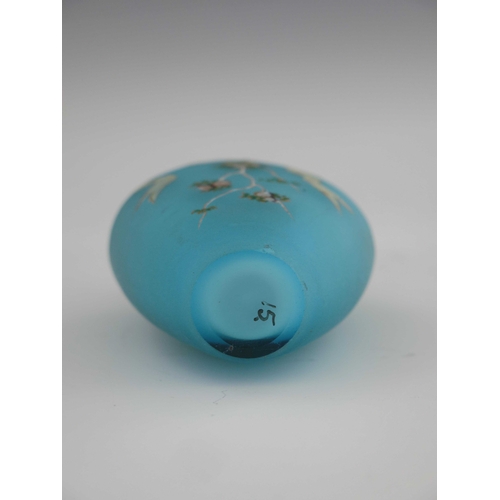 379 - An enamelled satin glass scent bottle, probably Continental, circa 1890, painted with ribbon and flo... 