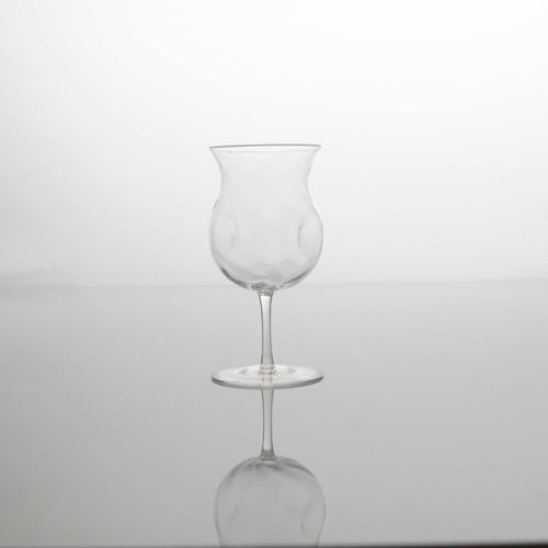 388 - Harry Powell for James Powell and Sons, Whitefriars, an Arts and Crafts wine glass, circa 1880, four... 