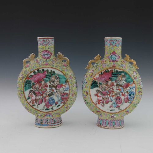 419 - A pair of 19th Century Chinese moonflasks, zoomorphic gilt twin handles, famille rose decorated with... 