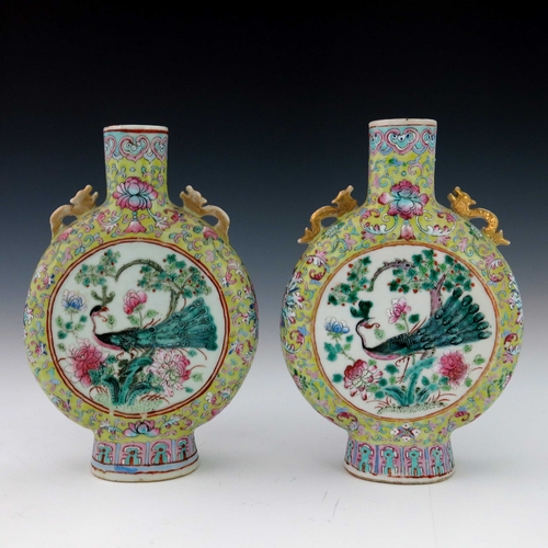 419 - A pair of 19th Century Chinese moonflasks, zoomorphic gilt twin handles, famille rose decorated with... 