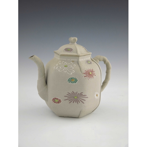 420 - A Japanese Kyoto Ware teapot, enamelled with chrysanthemums on a folded hexagonal section ovoid body... 