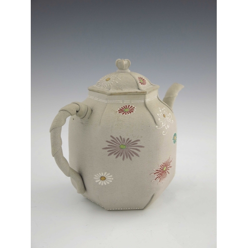 420 - A Japanese Kyoto Ware teapot, enamelled with chrysanthemums on a folded hexagonal section ovoid body... 