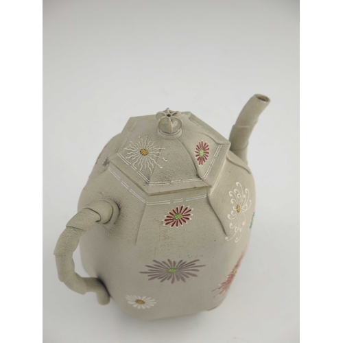 420 - A Japanese Kyoto Ware teapot, enamelled with chrysanthemums on a folded hexagonal section ovoid body... 