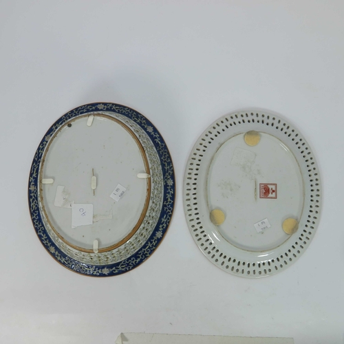 429 - A Chinese reticulated oval basket on matching stand, blue enamel decoration of scrollwork, white fol... 