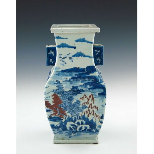 433 - A Chinese provincial blue and white baluster vase, 20th Century, of rectangular section with angular... 