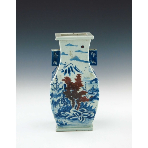 433 - A Chinese provincial blue and white baluster vase, 20th Century, of rectangular section with angular... 