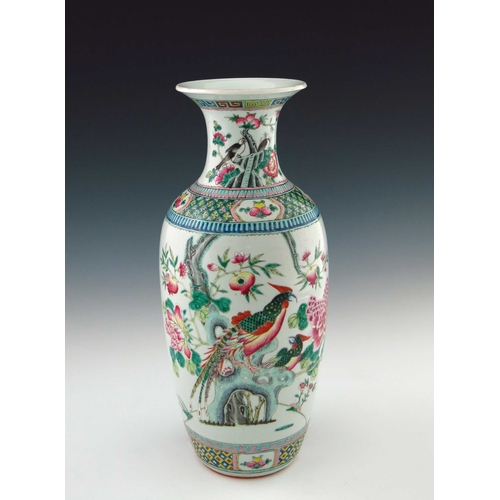 435 - A 19th Century Chinese baluster vase, famille rose decorated in enamels with scenes of exotic birds ... 