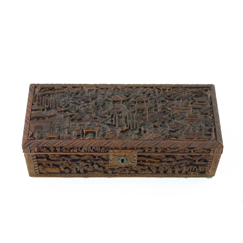 458 - A late 19th Century Canton treen table casket, carved throughout in high relief with figures and pag... 