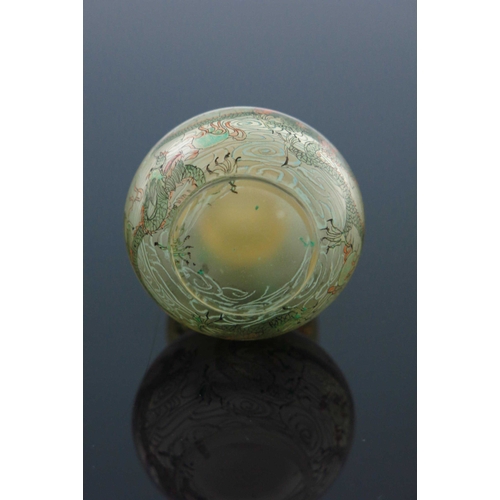 462 - A Chinese double gourd clear glass snuff bottle, internally painted with dragons amongst clouds chas... 