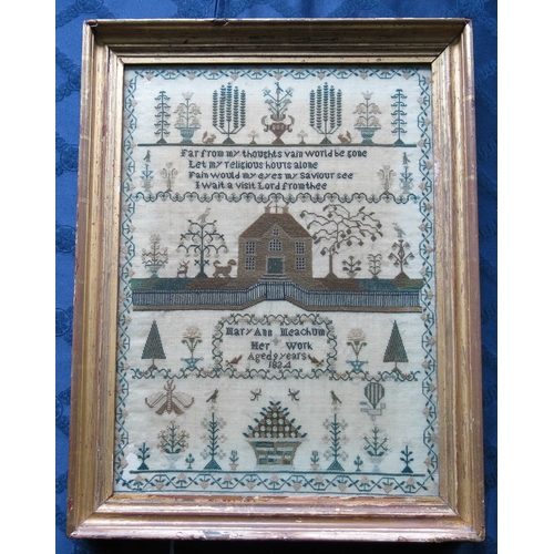 481 - A George IV textile pictorial sampler, strawberry border framing a double-fronted gated house surrou... 