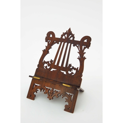 499 - A mid 19th Century rosewood table top music easel, circa 1860, fretwork lyre design, hinged to fold ... 