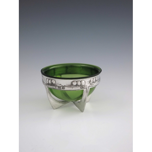 526 - Archibald Knox for Liberty and Co., an Arts and Crafts Tudric pewter and glass bowl, model 0319, cir... 