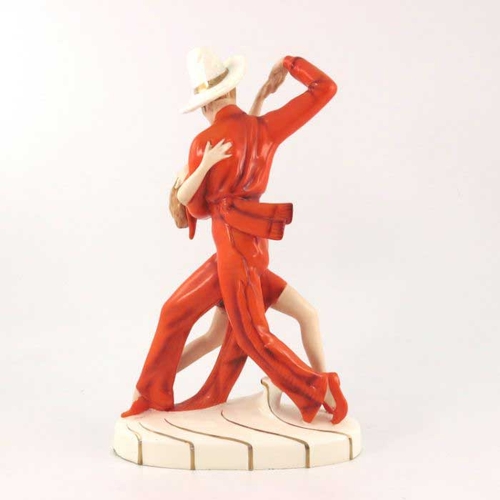 624 - Royal Dux, Tango Dancers, an Art Deco figure group, circa 1930, modelled in red outfits and hat, hig... 