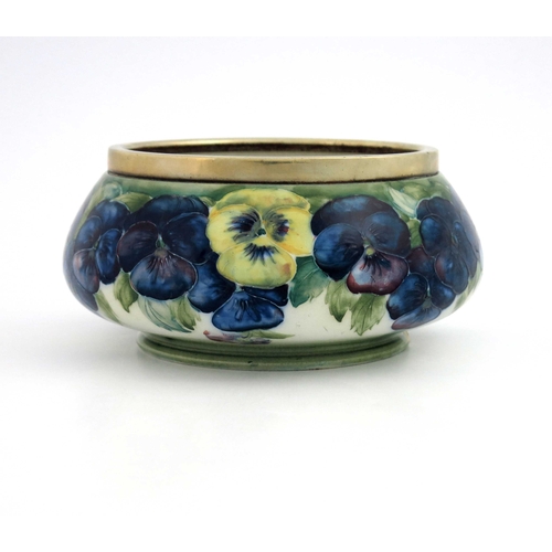 627 - William Moorcroft for James MacIntyre, a Pansy on White salad bowl, 1912, squat footed baluster form... 