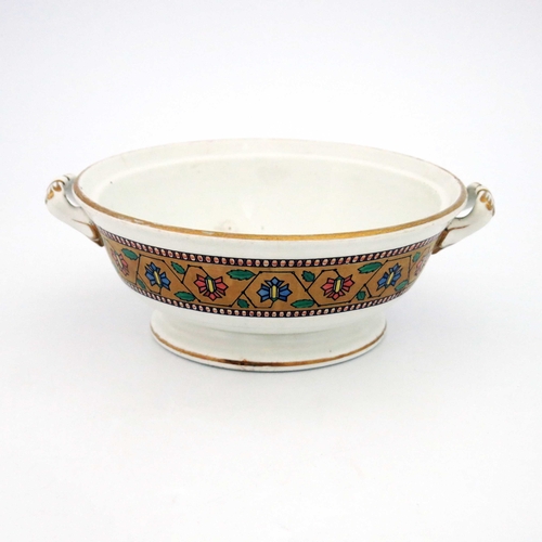 633 - Christopher Dresser for Minton, an Aesthetic Movement twin handled dish, 1865, footed and flared for... 