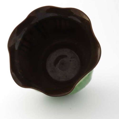 636 - Christopher Dresser for Watcombe, an art pottery jardiniere, dimpled ovoid form with flared and crim... 