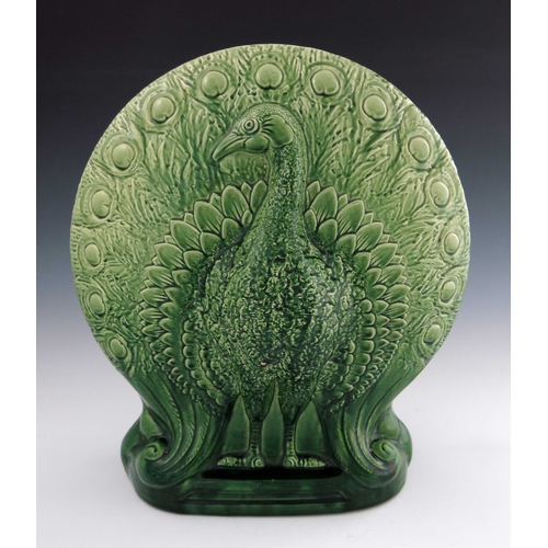 638 - Christopher Dresser for Ault, a large art pottery majolica glazed peacock vase, circa 1880, relief m... 